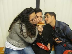 A very popular piece of pizza (Daniela Ortiz, Michael Xayavong, and Kevin Padilla, all North High School students.)